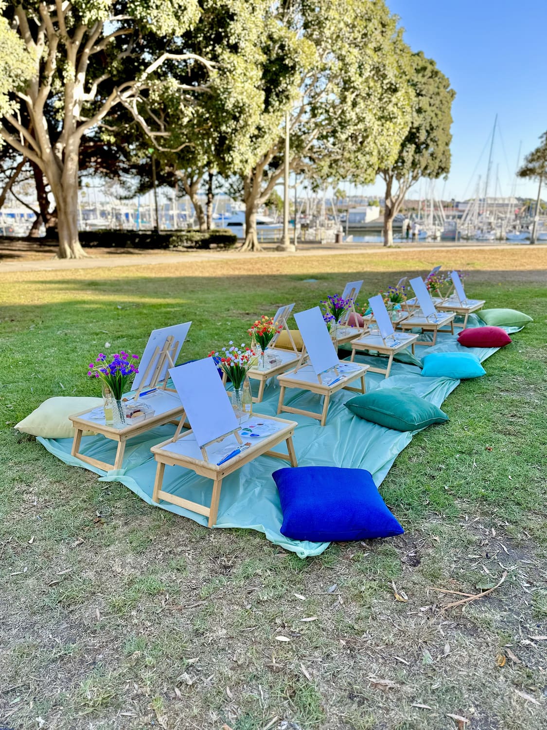 An outdoor picnic painting experience in the park