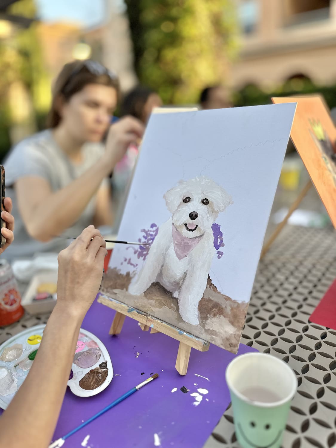 A guest creating a custom Paint Your Pet portrait